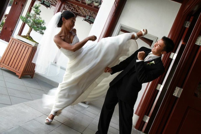 Bride kicking groom